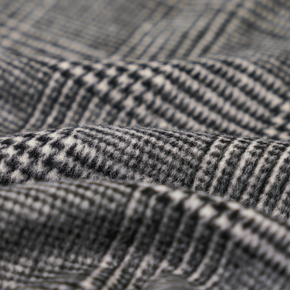 30% 羊毛、60% 聚酯纤维、10% 其他纤维、610G/M、黑白、格子单面覆膜织物、ML-20001